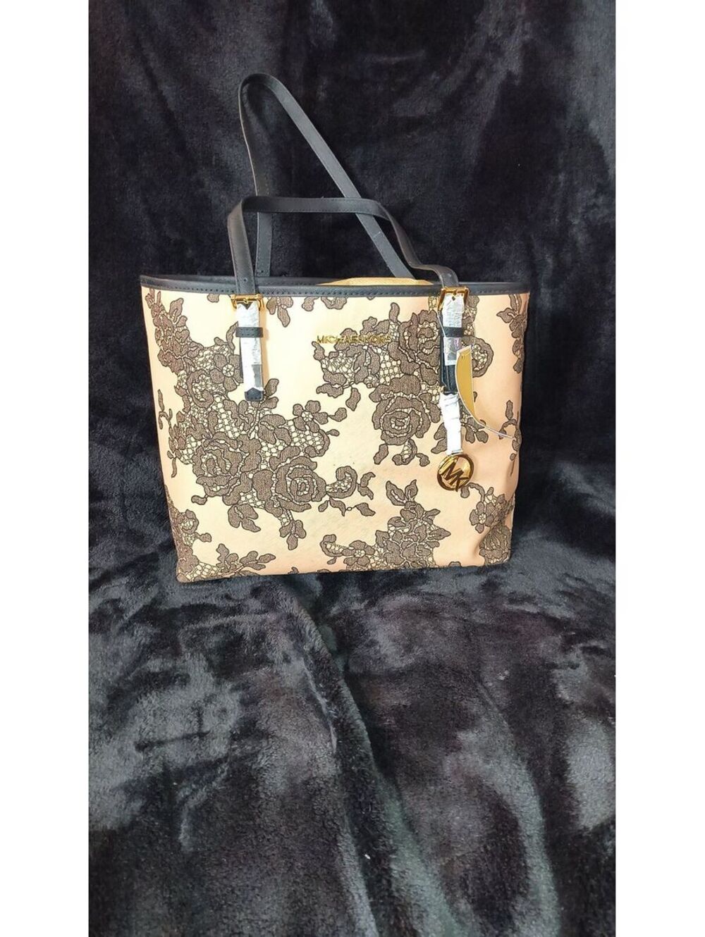 81. Michael Kors Emery Lace Jet Set Tote NWT